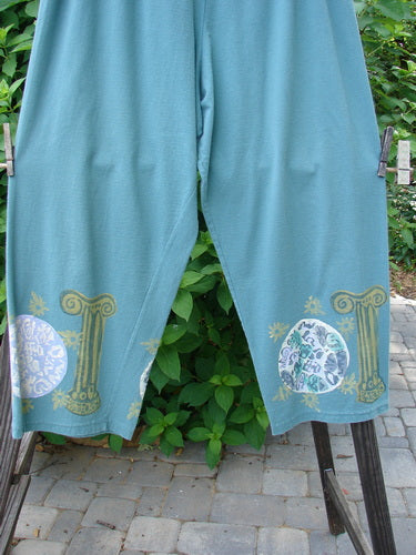 Image alt text: "1993 Crop Pant Pinwheel Grey Green Size 1: Fun capri pant with elastic waistline, oversized Blue Fish patch, and tapered lowers featuring pinwheel theme paint."