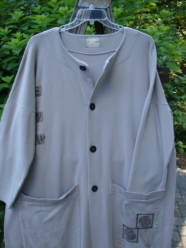 1999 Interlock Long Square Cardigan Jacket Tiny Fern Ash Size 1: A grey coat on a swinger, featuring a logo close-up.