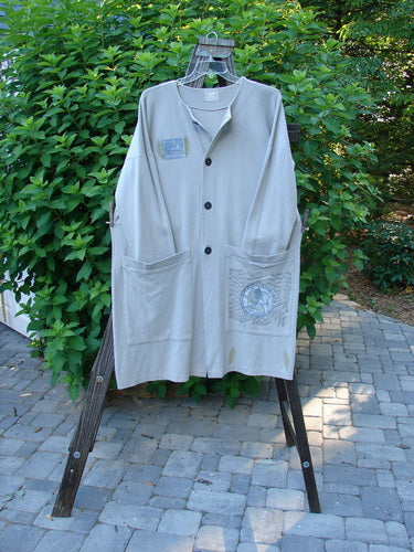 1999 Interlock Long Square Cardigan Jacket Fern Pod Ash Size 0: A long sleeved shirt with buttons on a rack.