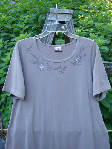 A grey Barclay Cotton Lycra Short Sleeved Twinkle Top on a swinger.