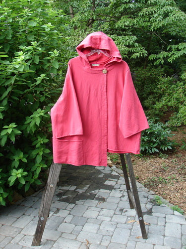 Barclay Fleece Single Button Hooded Jacket Unpainted Tulip Size 2: A cozy pink jacket with a single button closure and a super cozy hood. Features wide longer sleeves and a drop wrap around side pocket.