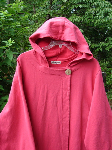 Barclay Fleece Single Button Hooded Jacket Unpainted Tulip Size 2: A cozy pink jacket with a hood and a single button closure. Features wide sleeves and a wraparound side pocket.