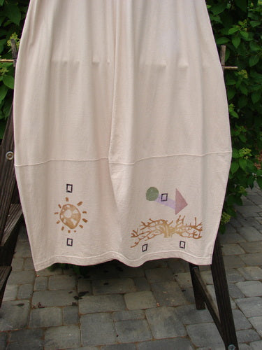 A white towel on a clothes rack, showcasing the 1996 4 Square Skirt Sun Sea Birch Bark Size 2.