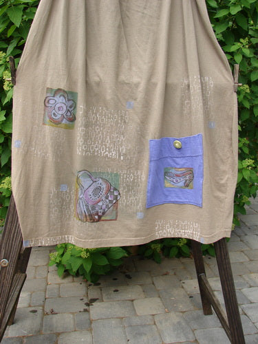 Image alt text: Barclay Big Pocket Skirt - Brown cloth with a pocket, unique bell-shaped bottom, and giant exterior pocket with vintage blue fish button closure. Drawstring waistline, deep side pockets. Size 2.