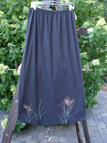 1998 Botanicals Corolla Skirt: Long skirt with a flower painted on it, featuring a full elastic waistband and a beautifully scooped front hemline. Size 2.