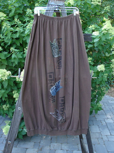 1996 Thermal Whimsical Skirt: Brown skirt with cat design, gathered hem, abstract tribal paint, and deep side pockets. Size 2.