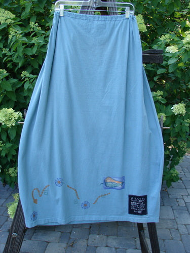 1996 Destination Skirt Travel by Path Sea Spray Size 2: A blue skirt with a drawstring waist, painted pockets, and a widening bell shape. Perfect for a summer collection.