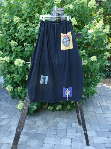 1996 Destination Skirt with Blue Fish Logo Patch, Black, Size 2. Full drawstring waistline, 3 painted pockets, widening lower bell shape.