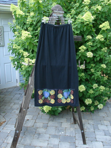 1999 Straight Skirt Bright Mosaic Florals on Wooden Stand. Full Elastic Waistline, A-Line Flare. Blue Fish Patch. Organic Cotton. Size 2.