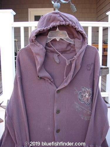 A 1995 Thermal West Wind Coat Hooded Butterfly Currant Size 1. A purple sweatshirt on a swinger, with a cozy cotton rib contrasting fabric, oversized floppy hood, and ribbed lower sleeves. Features oversized metal buttons, deep side pockets, and a rear drawcord.