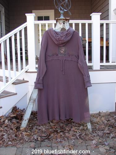 1995 Thermal West Wind Coat Hooded Butterfly Currant Size 1: A long purple dress with a hood on a swinger, featuring an oversized floppy hood, ribbed lower sleeves, and a varying hemline.
