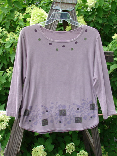 Barclay Cotton Lycra Round Hem Layering Top with a patterned design featuring berries and floral branches. Three-quarter length sleeves, rounded neckline, and vented sides. Size 1, lavender color.