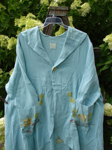 Image alt text: "1999 Breeze Jacket with sailor collar, swing panel, drop pockets, cherry and teatime theme paint, blue fish patch, and breezy flow."