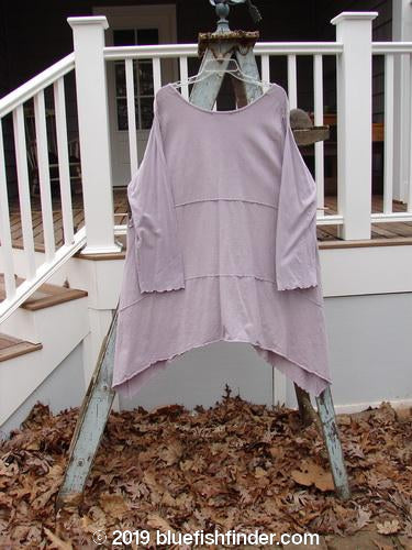 Barclay Cotton Lycra Vertical Gather Drop Pocket Dress Unpainted Lavender Size 2: A purple shirt with oversized front gathered pockets on a ladder.