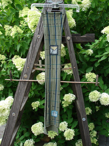 Image alt text: Barclay Patched Scarf - Wooden ladder with tie, outdoor, tree, flower, garden, plant, wooden, hydrangea.